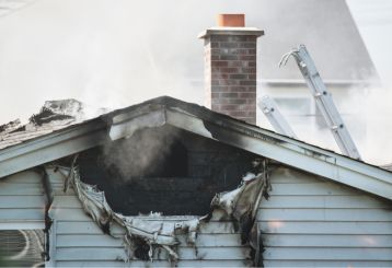 Fire cleanup process in progress at a Los Angeles residential property.